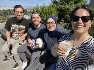 MacKenzie lab members enjoying coffee outside